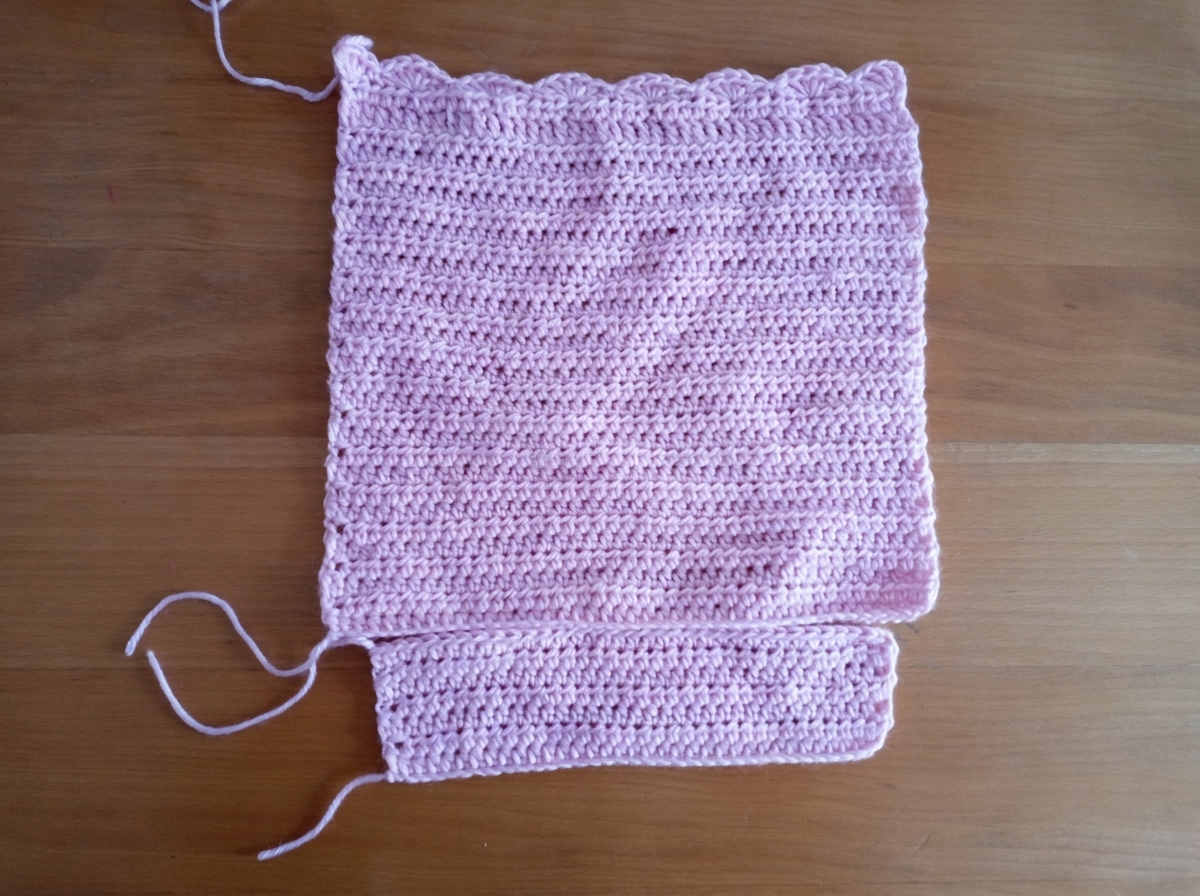 Step 1 of the crochet tote bag pattern showing the narrower bottom panel centered below the wider front panel